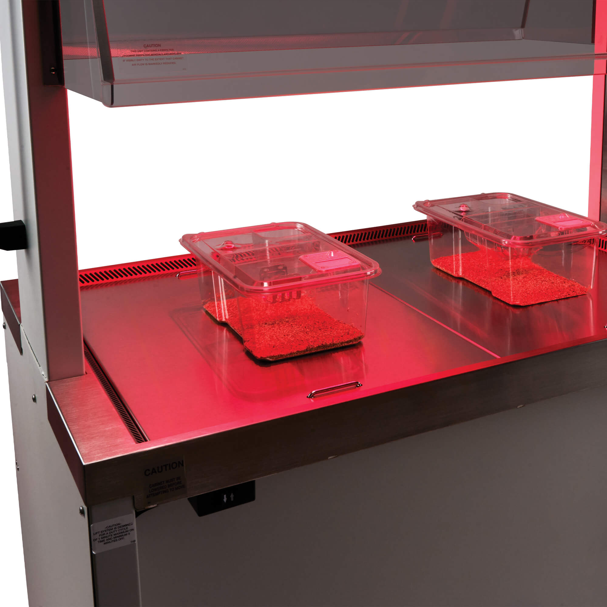 NU-622 Animal Transfer Station work zone illuminated with red light for nocturnal animal comfort